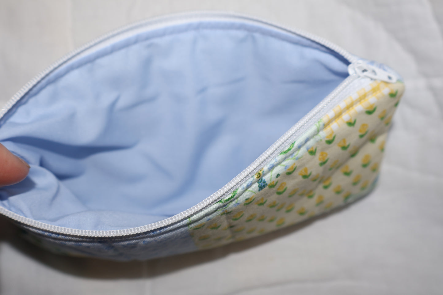 close up of a blue inner fabric on a pencil pouch